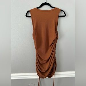 Mid length dress with ruched side ties burnt orange